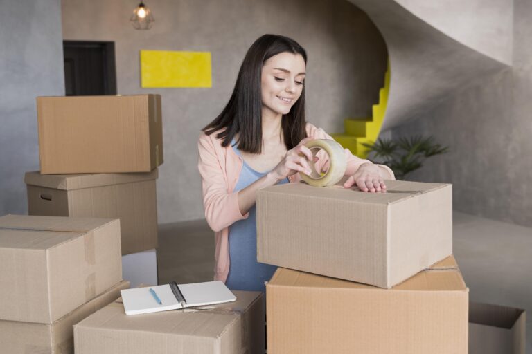 smiley-woman-preparing-boxes-shipment (2)